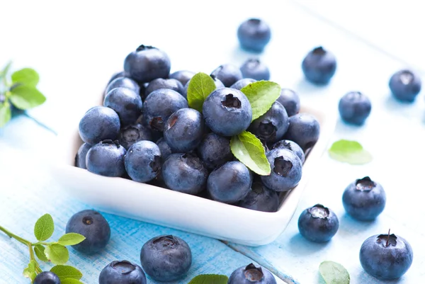 Fresh blueberriaes in white plate — Stock Photo, Image