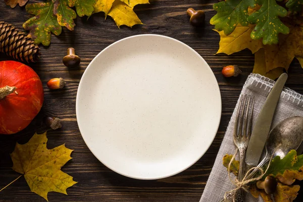 Autumn table setting top view.