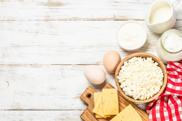 Dairy product at white wooden table. — Stock Photo, Image