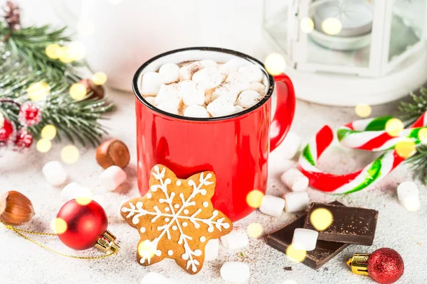 Hot chocolate with marshmallow and christmas cookies at white table. — Stock Photo, Image