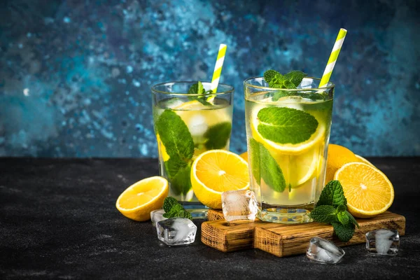 Lemonad in the glass at dark table. — Stock Photo, Image