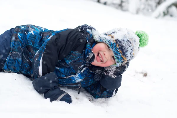 Happy boy in the snow — Stock Photo, Image