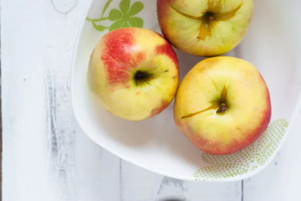 Some apples in the plate — Stock Photo, Image