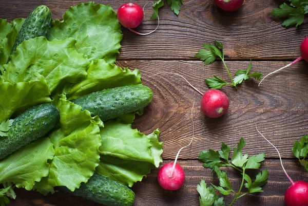 Lettuce, cucumbers  and radishes — Stock Photo, Image