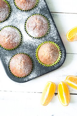 Yemek pişirme içinde turuncu muffins