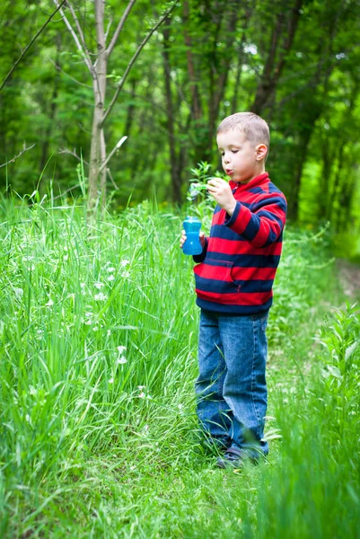 Boy and bubbles — Stock Photo, Image