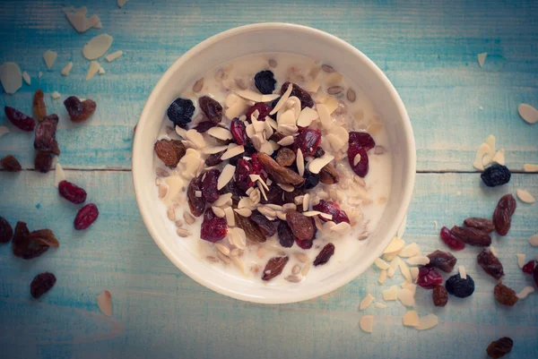 Oatmeal with dried fruit. — Stock Photo, Image