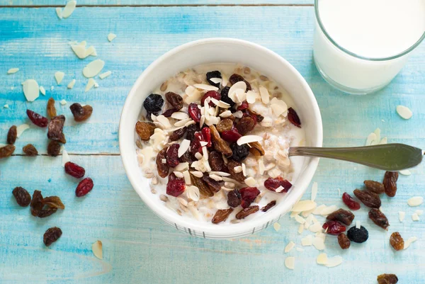 Oatmeal with dried fruit. — Stock Photo, Image