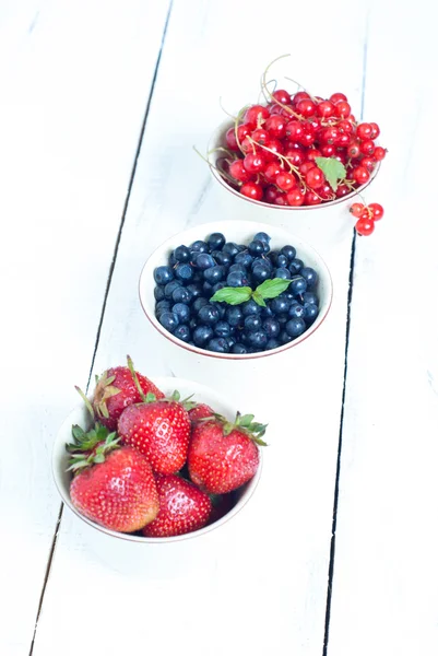 Bawls with different berries — Stock Photo, Image