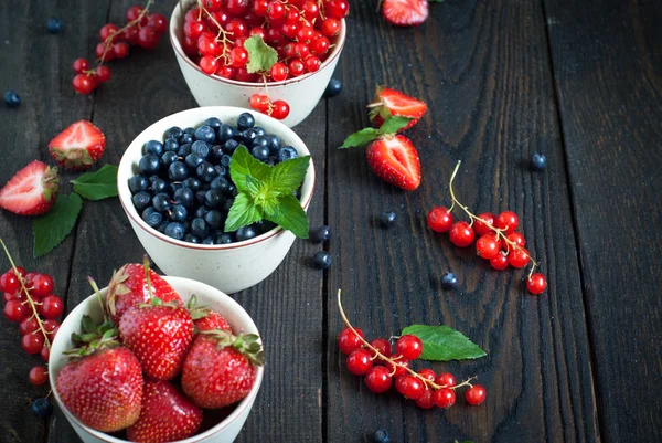 Bawls with different berries — Stock Photo, Image