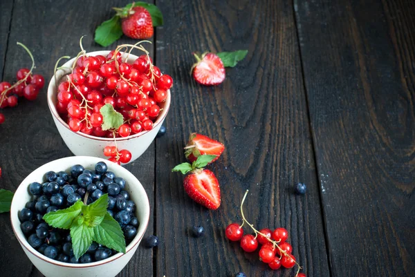 Bawls with different berries — Stock Photo, Image