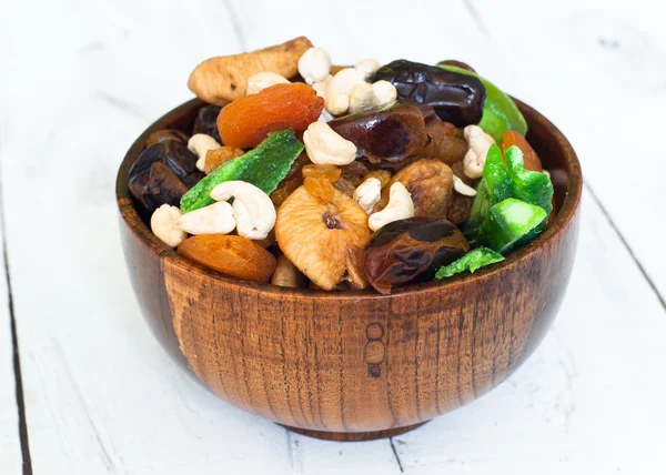 Dried fruits in a wooden bowl — Stock Photo, Image