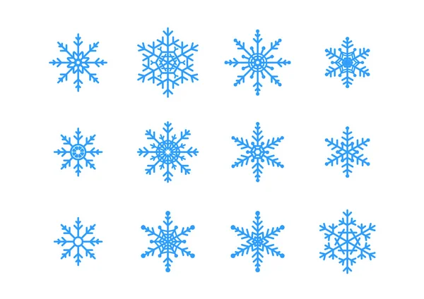 Flocos de neve azuis em branco — Fotografia de Stock