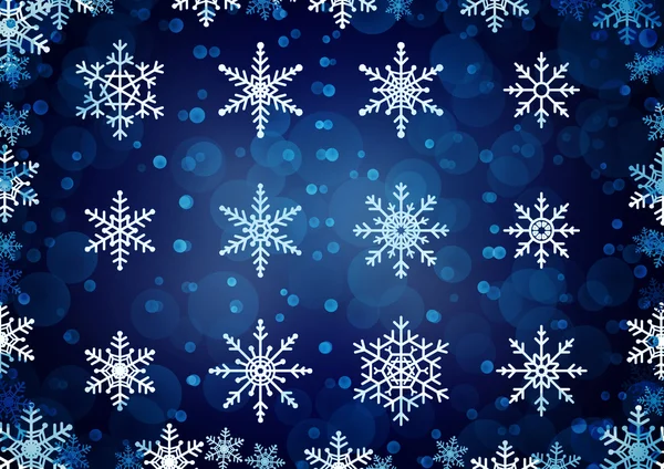 Verschiedene Schneeflocken auf dunkelblau — Stockfoto
