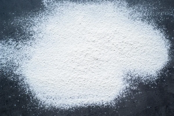 Flour background at dark — Stock Photo, Image