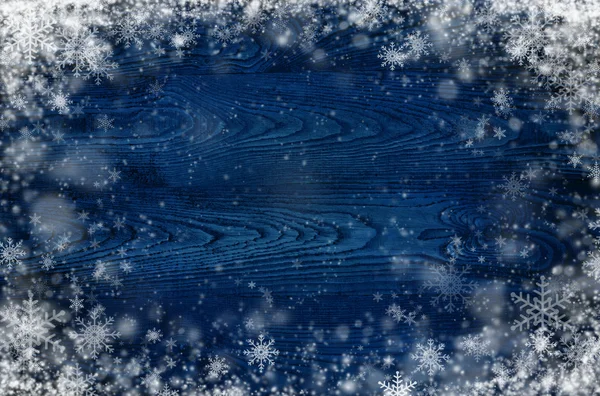 Fondo in legno scuro con fiocchi di neve — Foto Stock