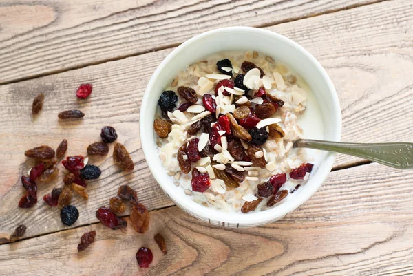 Oatmeal with dried fruit. — Stock Photo, Image