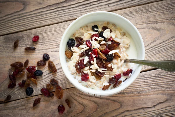 Oatmeal with dried fruit. — Stock Photo, Image