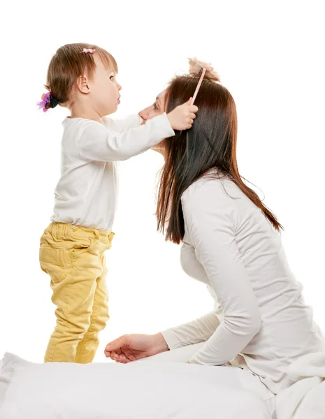 Daughter doing her Mother  hair — Stock Photo, Image