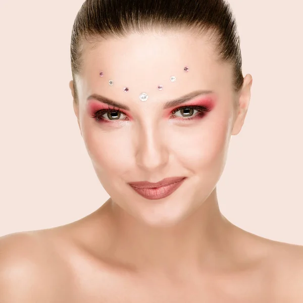 Frau mit artistischem Make-up — Stockfoto
