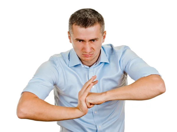 Exited young man kicks clenched fist arm — Stock Photo, Image