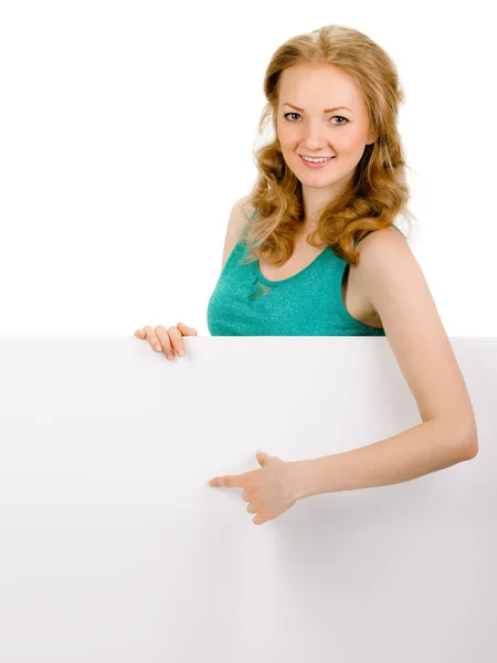 Young woman with blank billboard — Stock Photo, Image