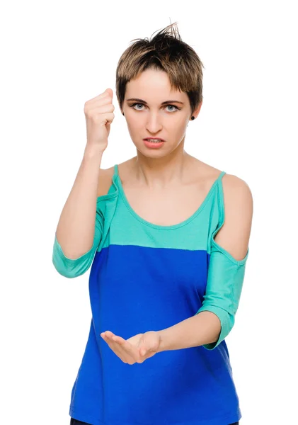Exited young woman kicks air clenched fists arm — Stock Photo, Image