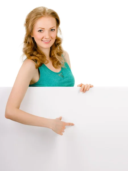 Young woman with blank billboard — Stock Photo, Image