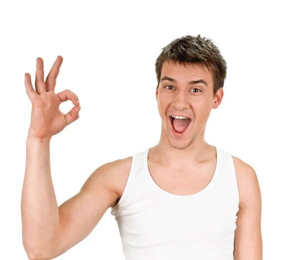Young fellow indicating ok sign — Stock Photo, Image