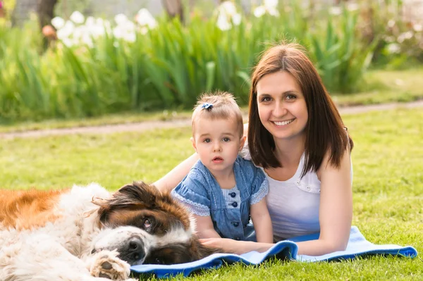 Mother daughter and dog Stock Photo