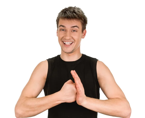 Exited young man kicks clenched fist arm — Stock Photo, Image