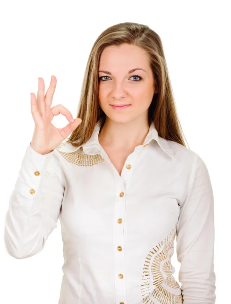 Молода леді, що вказує знак " Гаразд" — стокове фото