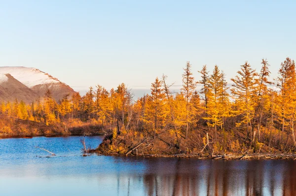 Mountain lake in tundra, deep autumn in the Taimyr Peninsula near Norilsk.