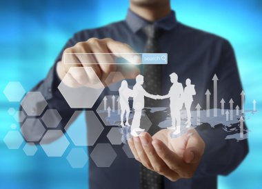 Finansal sembolleri olan bir iş adamı geliyor.