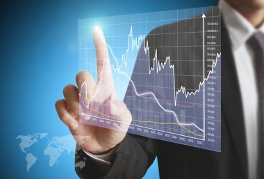 Finansal sembolleri olan bir iş adamı geliyor.