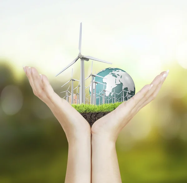 Turbinas eólicas na mão — Fotografia de Stock
