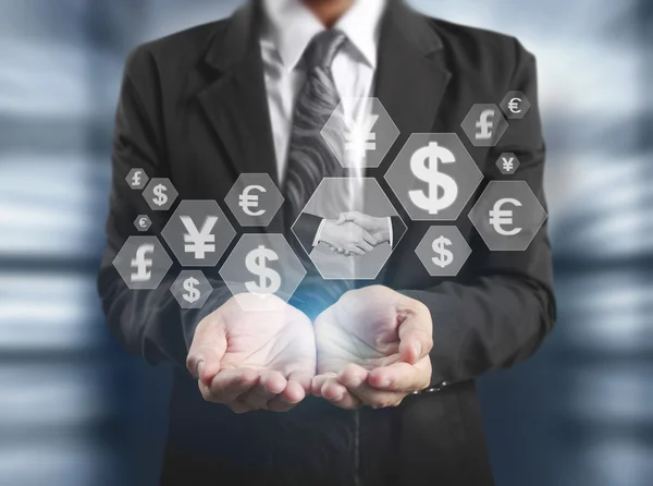 Financial symbols coming from hand — Stock Photo, Image