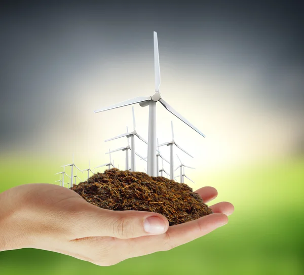 Eco power, turbin wiatrowych w dłoni — Zdjęcie stockowe