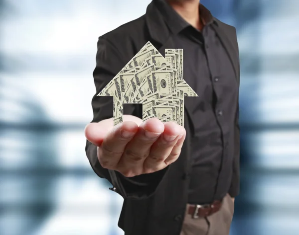 Man house in hands — Stock Photo, Image