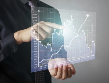 Finansal sembolleri olan bir iş adamı geliyor.