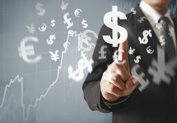 Businessman with financial symbols coming — Stock Photo, Image