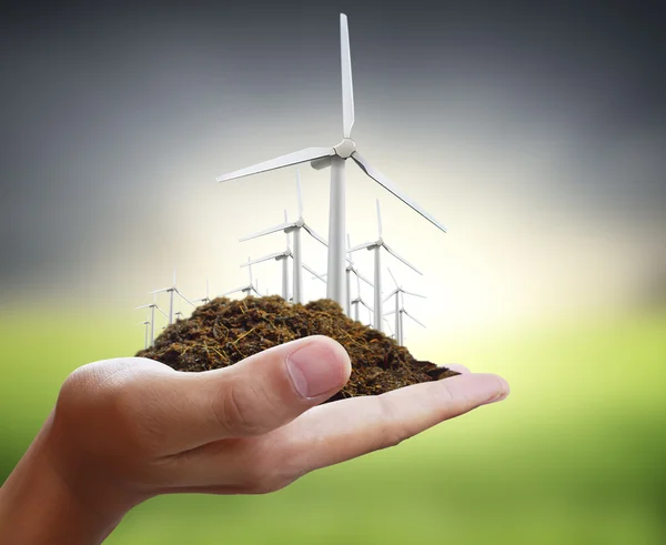 Eco power, wind turbines in  hand — Stock Photo, Image