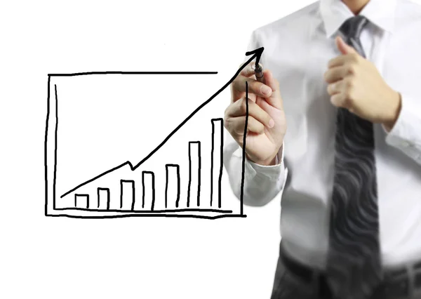 Businessman drawing   growing graph Stock Photo