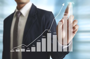 İşadamı comin finansal simgeler ile