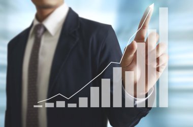 İşadamı comin finansal simgeler ile