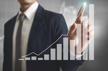 İşadamı comin finansal simgeler ile