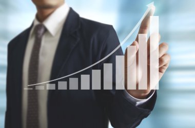 İşadamı comin finansal simgeler ile