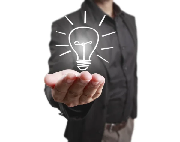 Holding light bulb in hand — Stock Photo, Image