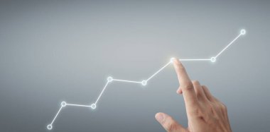 Finansal gösterge ve muhasebe piyasa analizi grafiklerine elle dokunmak