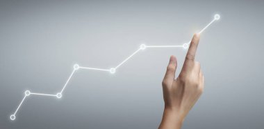 Finansal gösterge ve muhasebe piyasa analizi grafiklerine elle dokunmak